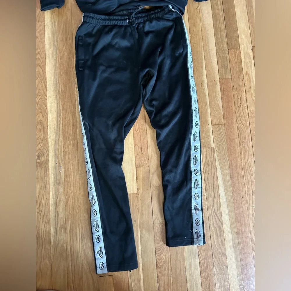 New in the bag black sweatshirt and sweatpants sealed in package.  Sz S, Med, XL - Picture 4 of 13